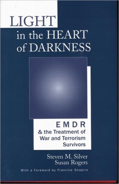 Book cover of: Light in the Heart of Darkness. By: Steven M. Silver