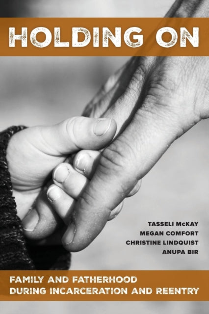 Book cover of: Holding On. By: Tasseli McKay
