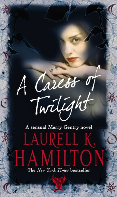 Book cover of: Caress Of Twilight. By: Laurell K. Hamilton