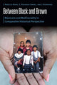 Book cover of: Between Black and Brown. By: Rebecca Romo