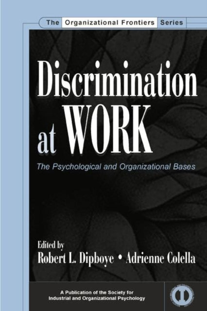 Book cover of: Discrimination at Work. By: Robert L. Dipboye