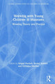 Book cover of: Working with Young Children in Museums. By: Abigail Hackett