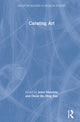 Book cover of: Curating Art. By: Janet Marstine
