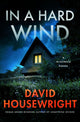 Book cover of: In a Hard Wind. By: David Housewright