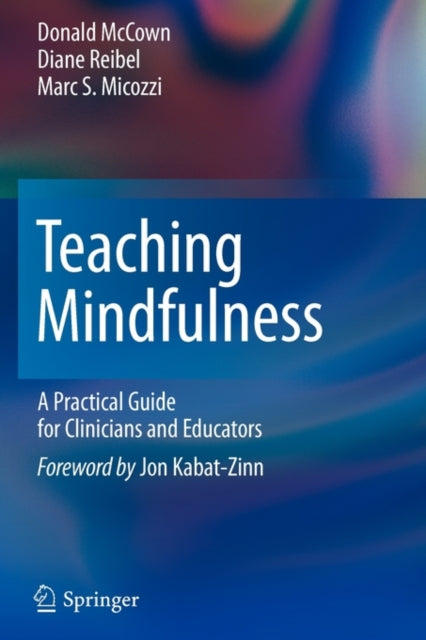 Book cover of: Teaching Mindfulness. By: Donald McCown