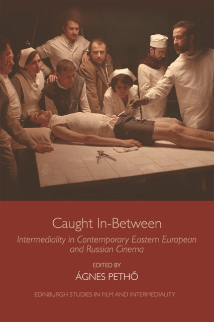 Book cover of: Caught in-Between. By: Ágnes Petho