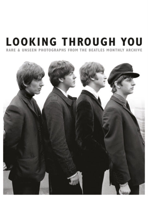 Book cover of: Looking Through You: The Beatles Book Monthly Photo Archive. By: Tom Adams