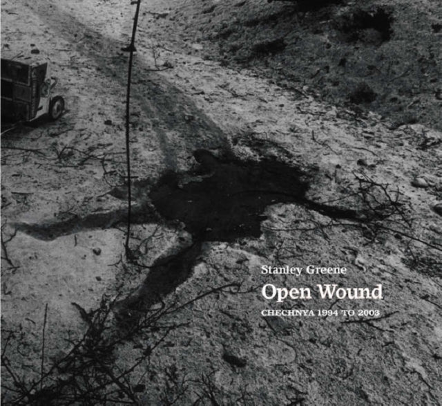 Book cover of: Stanley Greene: Open Wound. By: André Glucksmann