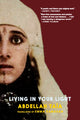Book cover of: Living in Your Light. By: Abdellah Taia